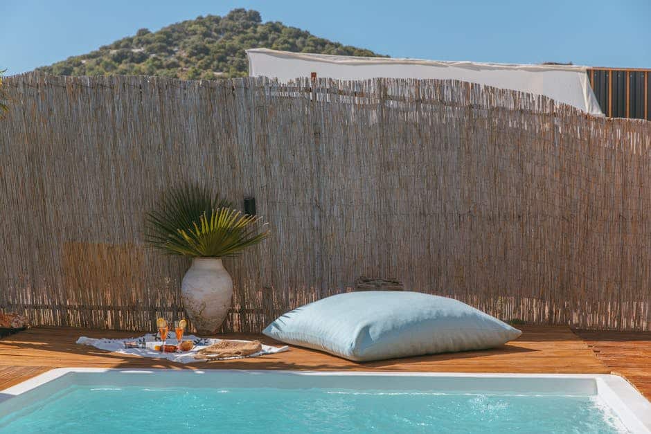 Outdoor patio cushions with olefin fabric on a Florida pool deck showing color retention after sun exposure