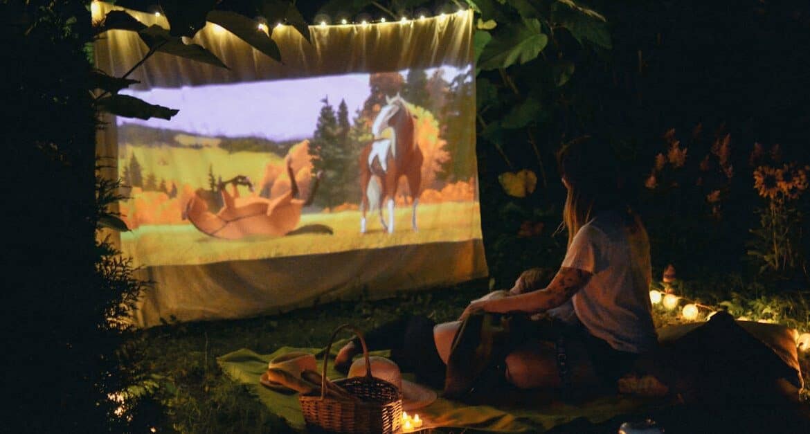 Backyard movie night patio setup florida