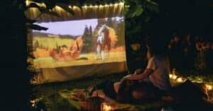 Backyard movie night patio setup florida