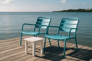 Corrosion-resistant aluminum patio chairs and side table on a Florida saltwater boat dock