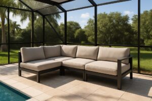 Powder-coated aluminum outdoor sectional on a screened Florida lanai beside a pool