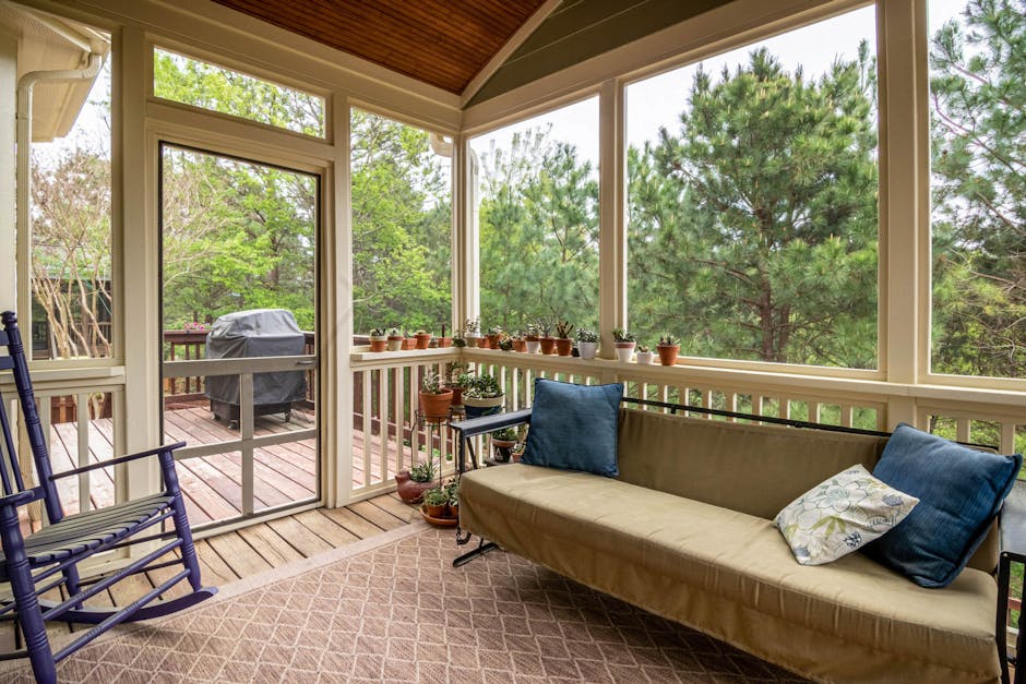 4-inch Sunbrella outdoor lounger cushion on an aluminum chaise lounge on a Florida screened porch
