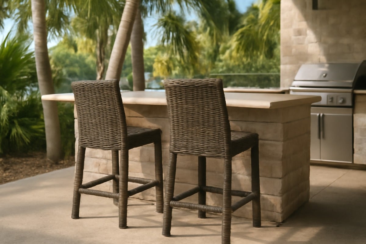 Sling-seat swivel bar stools beside a pool bar in coastal Florida