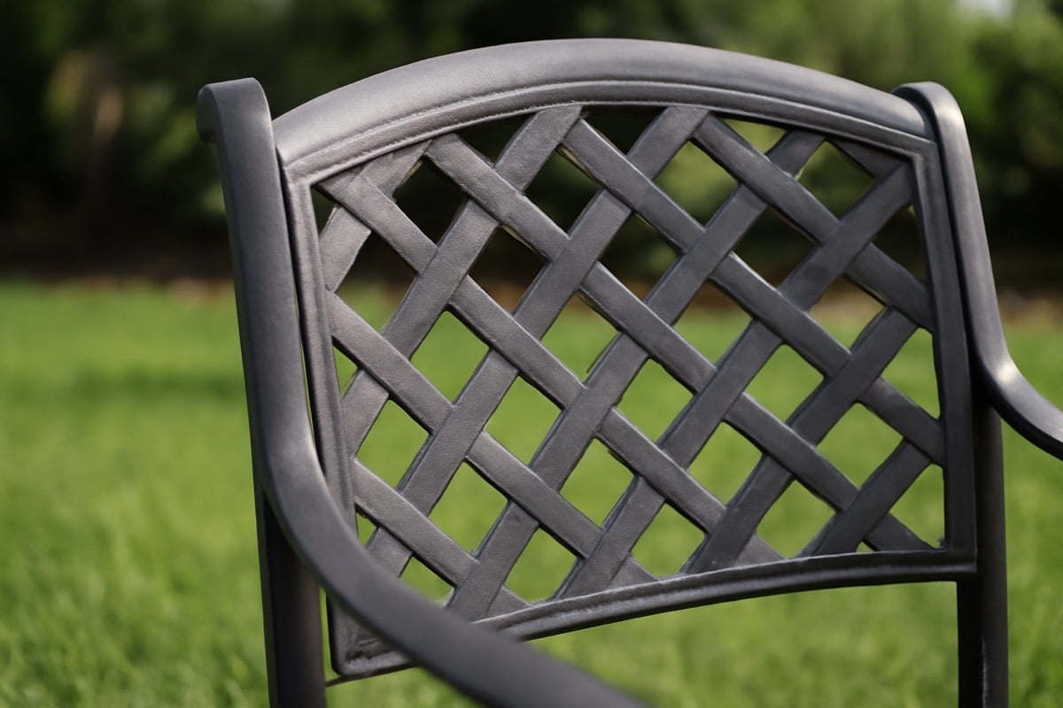 Powder coated aluminum patio furniture on a sunny Florida lanai withstanding summer UV