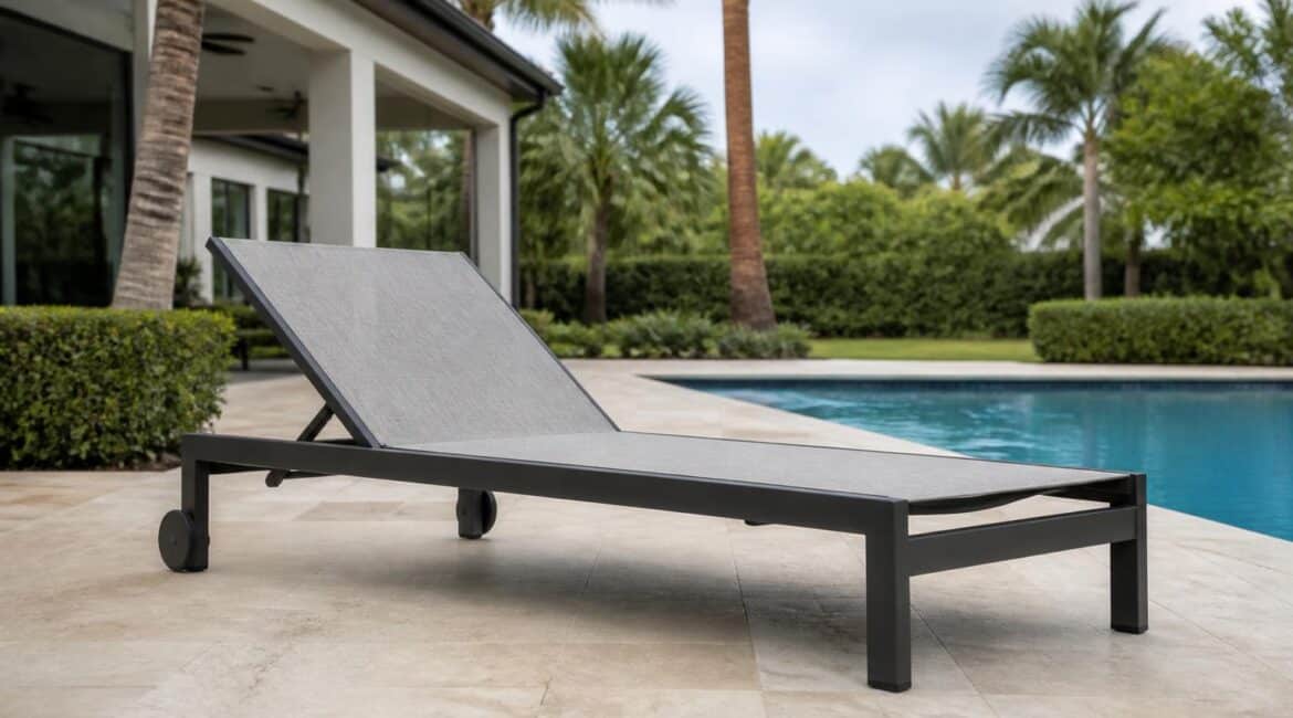 Wheeled outdoor chaise lounge on a paved patio