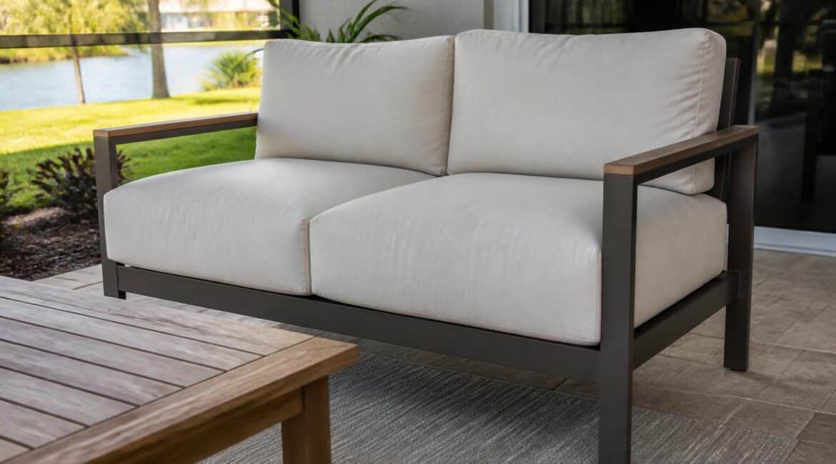 Outdoor loveseat arranged to show seat depth