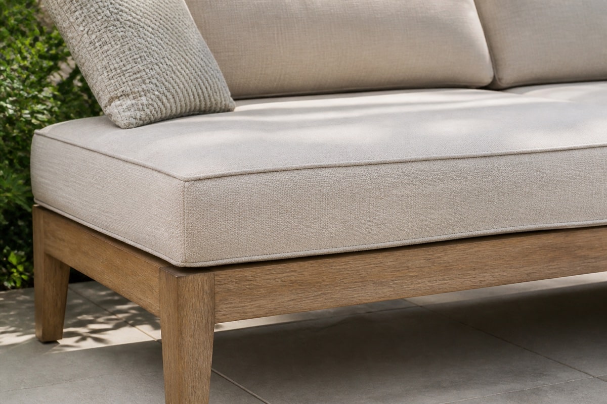 outdoor sofa with a single bench cushion on a covered patio