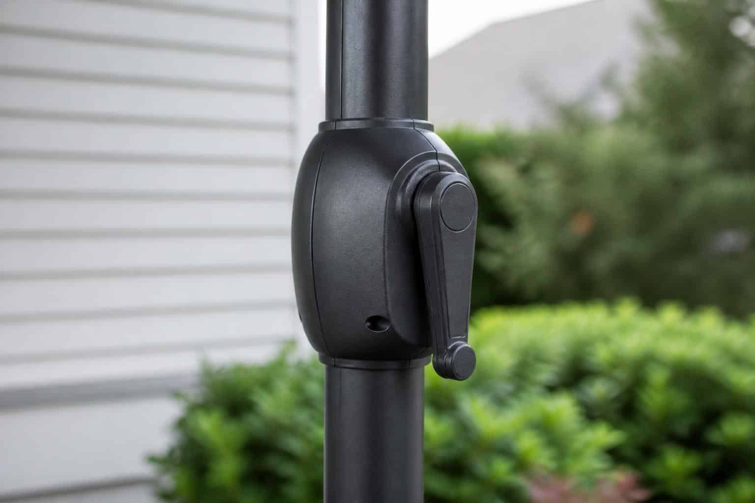 Crank-lift patio umbrella opened above an outdoor dining table