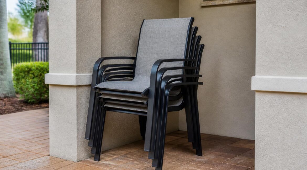 Stackable patio chairs arranged to show their storage footprint