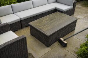cleaning pollen from a wicker patio set overview in Florida