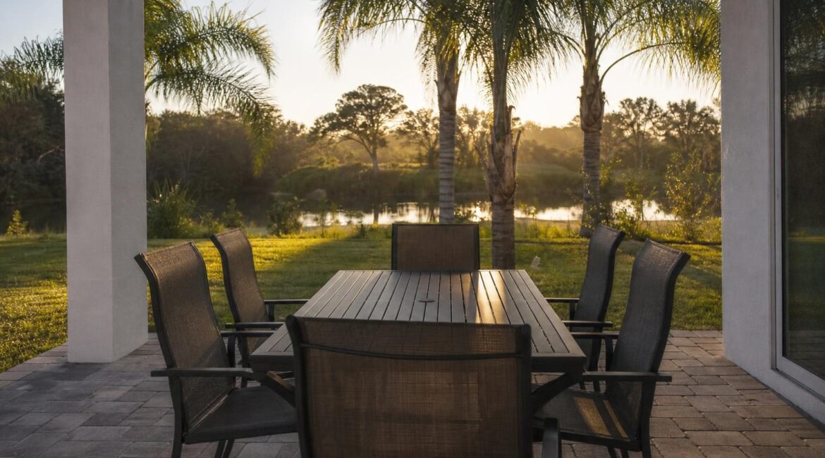 Patio dining set in soft early morning light