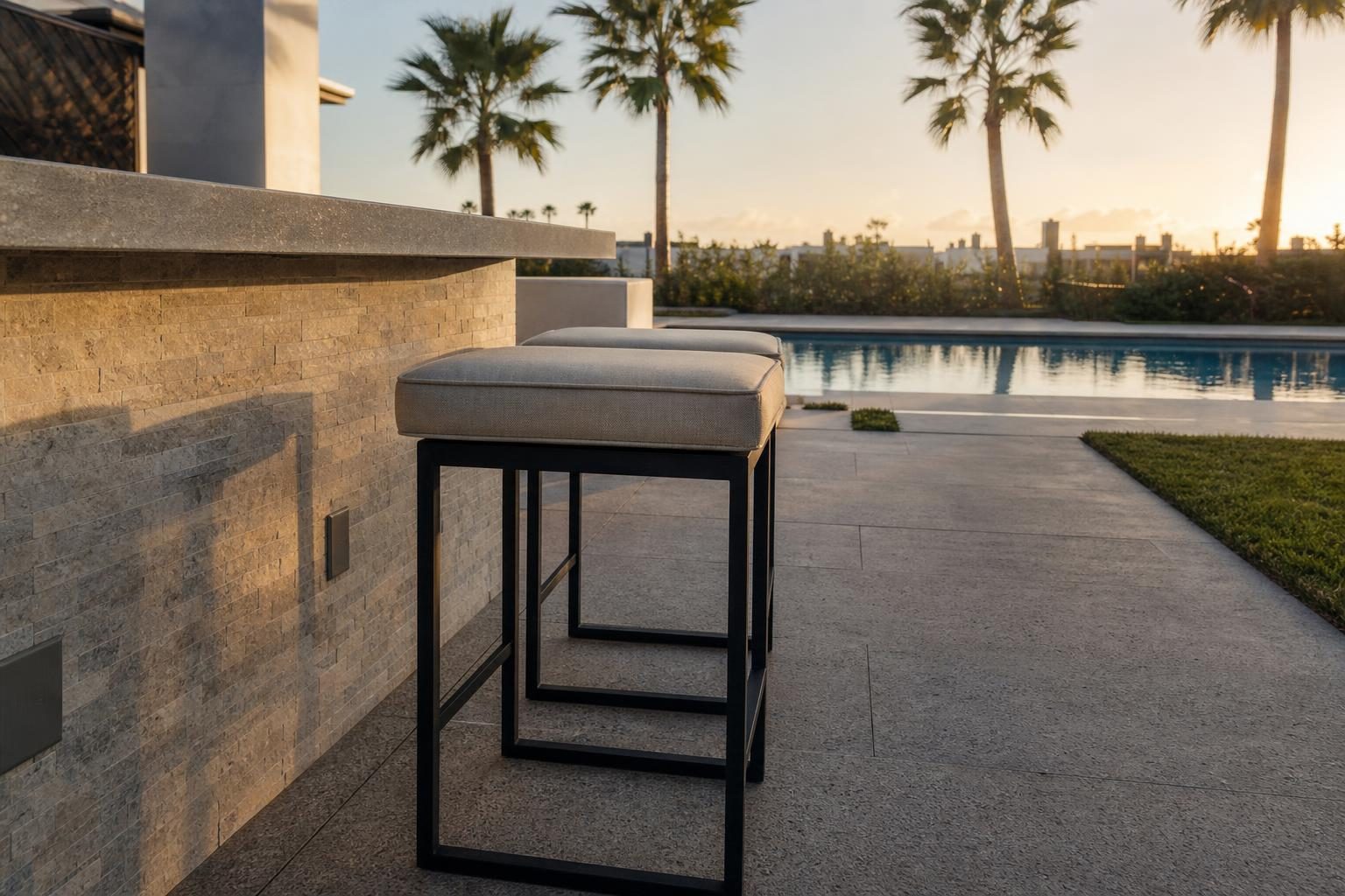 Side view of a backless outdoor bar stool at a counter
